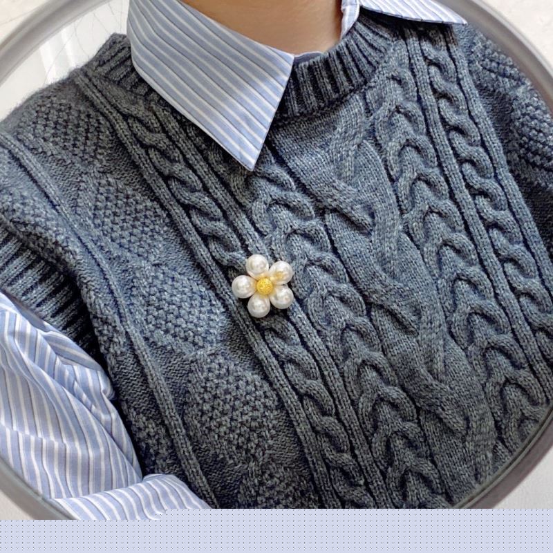 Ch*el brooches